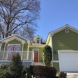 Photo by Nelson Exteriors. Bright exterior paint job - thumbnail