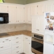 Photo by Fresh Coat Painters of Denton. Cabinet Painting & Staining - thumbnail