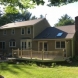 Photo by Beantown Home Improvements. Owens Corning Roof in Driftwood - thumbnail