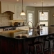 Photo by Crimson Design & Construction. Kitchen Remodels - thumbnail