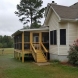 Photo by All American Exteriors. Back Porch Addition - thumbnail
