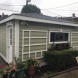Photo by Pro Home 1. New James Hardie siding on this enclosed porch and garage - thumbnail