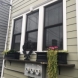 Photo by Pro Home 1. New James Hardie siding on this enclosed porch and garage - thumbnail