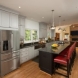 Photo by Tabor Design Build. Three Story Rear Addition & Kitchen Remodel - thumbnail