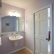 Photo by Golden Rule Creative Remodel. Sky and Stone Bath - thumbnail