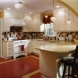 Photo by Sylvestre Construction Inc. kitchen/ family room/mud room - thumbnail
