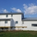 Photo by All American Exteriors. Farmhouse Remodel - thumbnail
