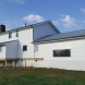 Photo by All American Exteriors. Farmhouse Remodel - thumbnail