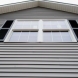 Photo by Unified Home Remodeling. Siding - thumbnail