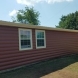 Photo by ABC Seamless of North East Oklahoma. Cinnamon Log Siding - thumbnail