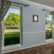 Photo by Woodbridge Home Exteriors. Windows and Storm Doors - thumbnail