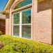 Photo by Woodbridge Home Exteriors. Windows and Storm Doors - thumbnail