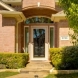 Photo by Woodbridge Home Exteriors. Windows and Storm Doors - thumbnail