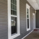 Photo by Woodbridge Home Exteriors. Siding - thumbnail