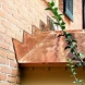 Photo by BRAX Roofing. Copper roof over front door  - thumbnail