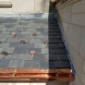 Photo by BRAX Roofing. New seamless half round copper gutters and snow guards.  - thumbnail