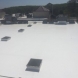 Photo by BRAX Roofing. New silicone roof coating for flat roof.  - thumbnail