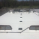 Photo by BRAX Roofing. New silicone roof coating for flat roof.  - thumbnail