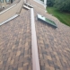 Photo by BRAX Roofing. Owens corning Duration shingle roof replacement with velux skylights - thumbnail