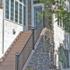 Photo by EBY Exteriors Inc.. Rivera Stairs, Railing & Stone - thumbnail