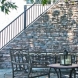 Photo by EBY Exteriors Inc.. Rivera Stairs, Railing & Stone - thumbnail