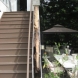 Photo by EBY Exteriors Inc.. Rivera Stairs, Railing & Stone - thumbnail