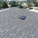 Photo by Elite Roof Services. OC Onyx Black Duration Shingles - thumbnail