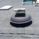 Photo by Elite Roof Services. OC Onyx Black Duration Shingles - thumbnail