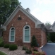 Photo by STL Siding Pros. Cobblestone James Hardie Siding with Arctic White Trim - thumbnail