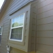 Photo by Integrity Roofing, Siding, Gutters & Windows. Complete James Hardie Color Plus system in Lees Summit, MO - thumbnail