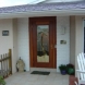 Photo by Hammer and Nail Exteriors. Signature Doors - thumbnail