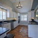 Photo by Broderick Builders. Main Floor Remodel-Kitchen/Family Room - thumbnail