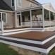 Photo by Professional Building Services. Custom Designed and Built Deck and 3 Season Room - thumbnail