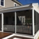 Photo by Professional Building Services. Custom Designed and Built Deck and 3 Season Room - thumbnail