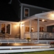 Photo by Professional Building Services. Custom Designed and Built Deck and 3 Season Room - thumbnail