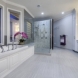 Photo by Interiors with Elegance. Contemporary Bathroom Remodel - thumbnail