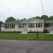 Photo by Care Free Homes Inc.. Vinyl Siding & Kitchen Remodel - Before & After - thumbnail