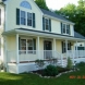 Photo by Care Free Homes Inc.. Farmer's Porch Addition - thumbnail