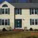 Photo by Care Free Homes Inc.. Farmer's Porch Addition - thumbnail