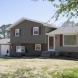 Photo by Hullco. Exteria Stacked Stone and Shake Siding - thumbnail