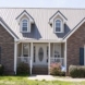 Photo by Hullco. Exteria Stacked Stone and Shake Siding - thumbnail