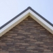 Photo by Hullco. Exteria Stacked Stone and Shake Siding - thumbnail