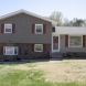 Photo by Hullco. Exteria Stacked Stone and Shake Siding - thumbnail