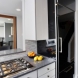 Photo by Normandy Remodeling. Modern Kitchen Cabinet Solutions - thumbnail