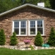 Photo by Craftsman's Choice. Siding and stone - thumbnail