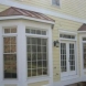 Photo by Colonial Remodeling. Porticos, Porches and Additions - thumbnail