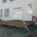 Photo by Home Renu.  Fenced Yard, Deck and Screened Porch - thumbnail