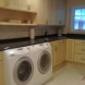 Photo by North Shore Closets & Cabinetry. Laundry Room - thumbnail