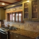 Photo by Blue Mountain Kitchens. Earth Inspired Rustic Kitchen Remodel - thumbnail