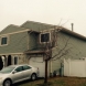 Photo by Impact Remodeling. Siding, Windows, Gutters. - thumbnail
